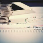 Monete e grafico di rendimento, fondi di investimento