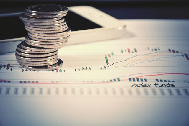 Monete e grafico di rendimento, fondi di investimento