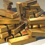 Lingotti d'oro impilati, metalli preziosi