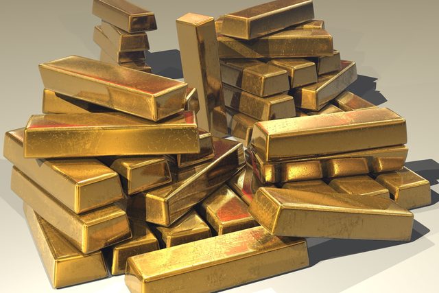 Lingotti d'oro impilati, metalli preziosi